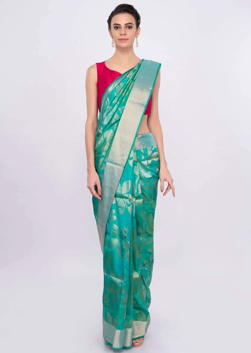 Green and blue color brocade saree only on Kalki