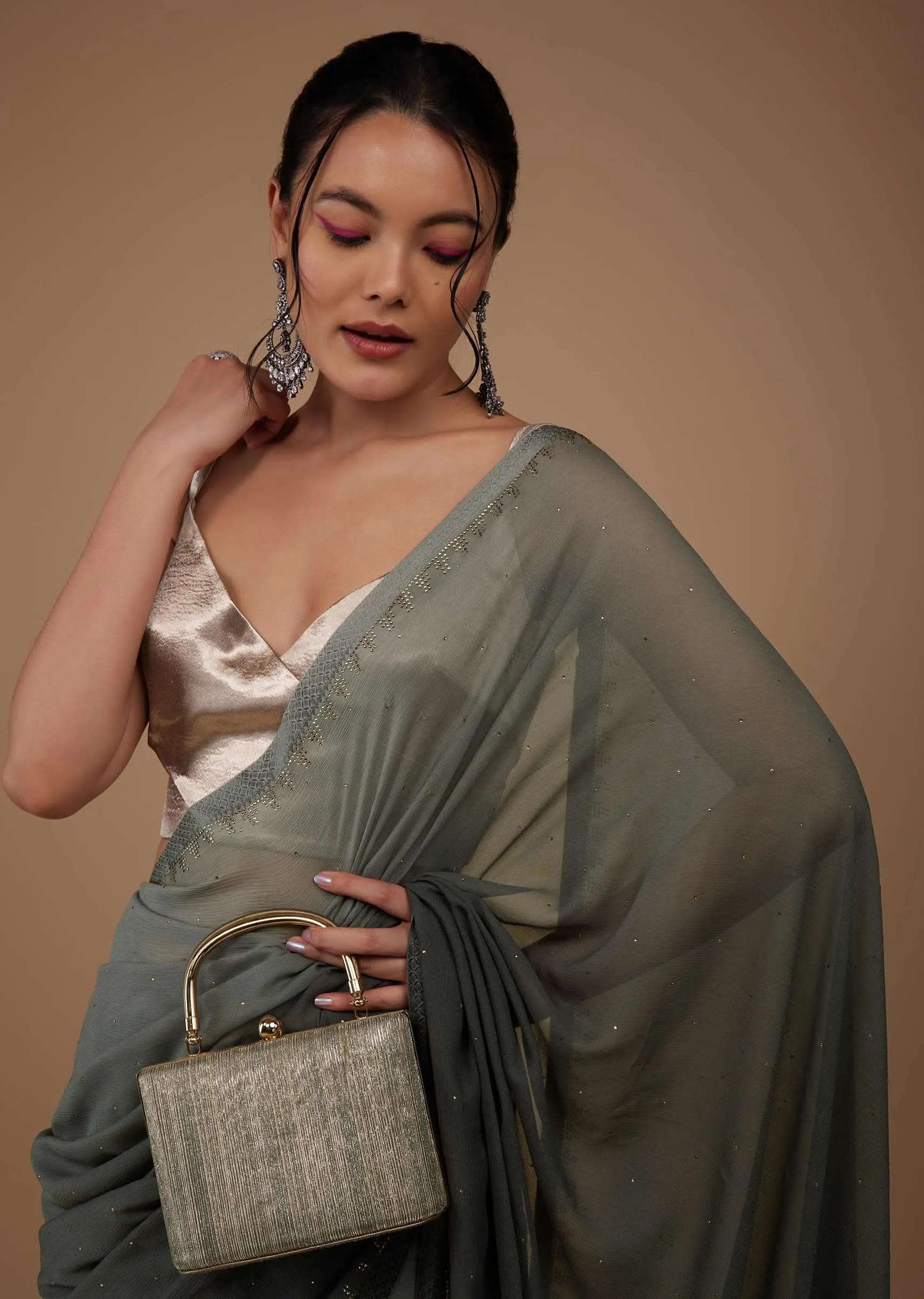Iron Grey Chiffon Saree With Swarovski Stone Embellishments And Satin Border