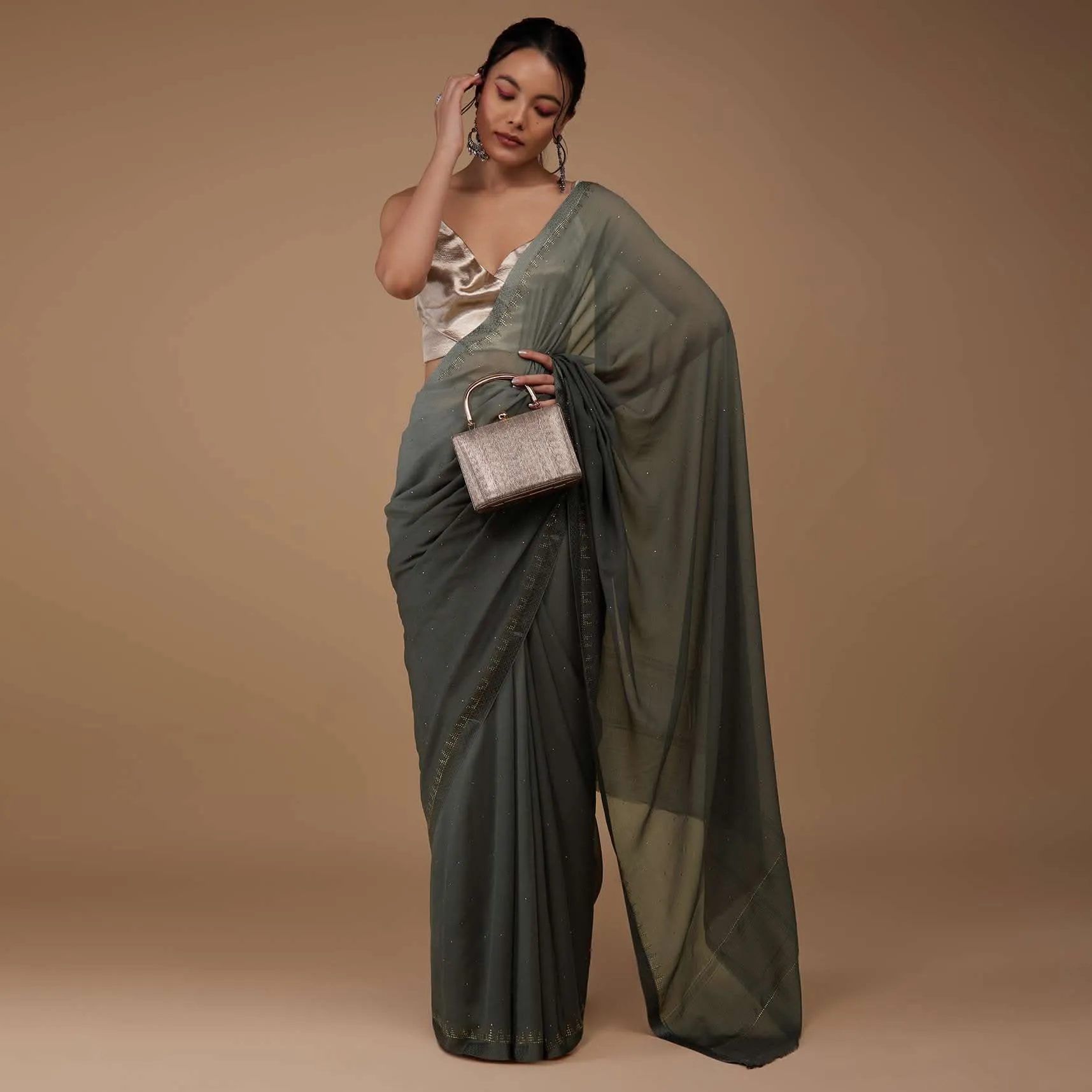 Iron Grey Chiffon Saree With Swarovski Stone Embellishments And Satin Border