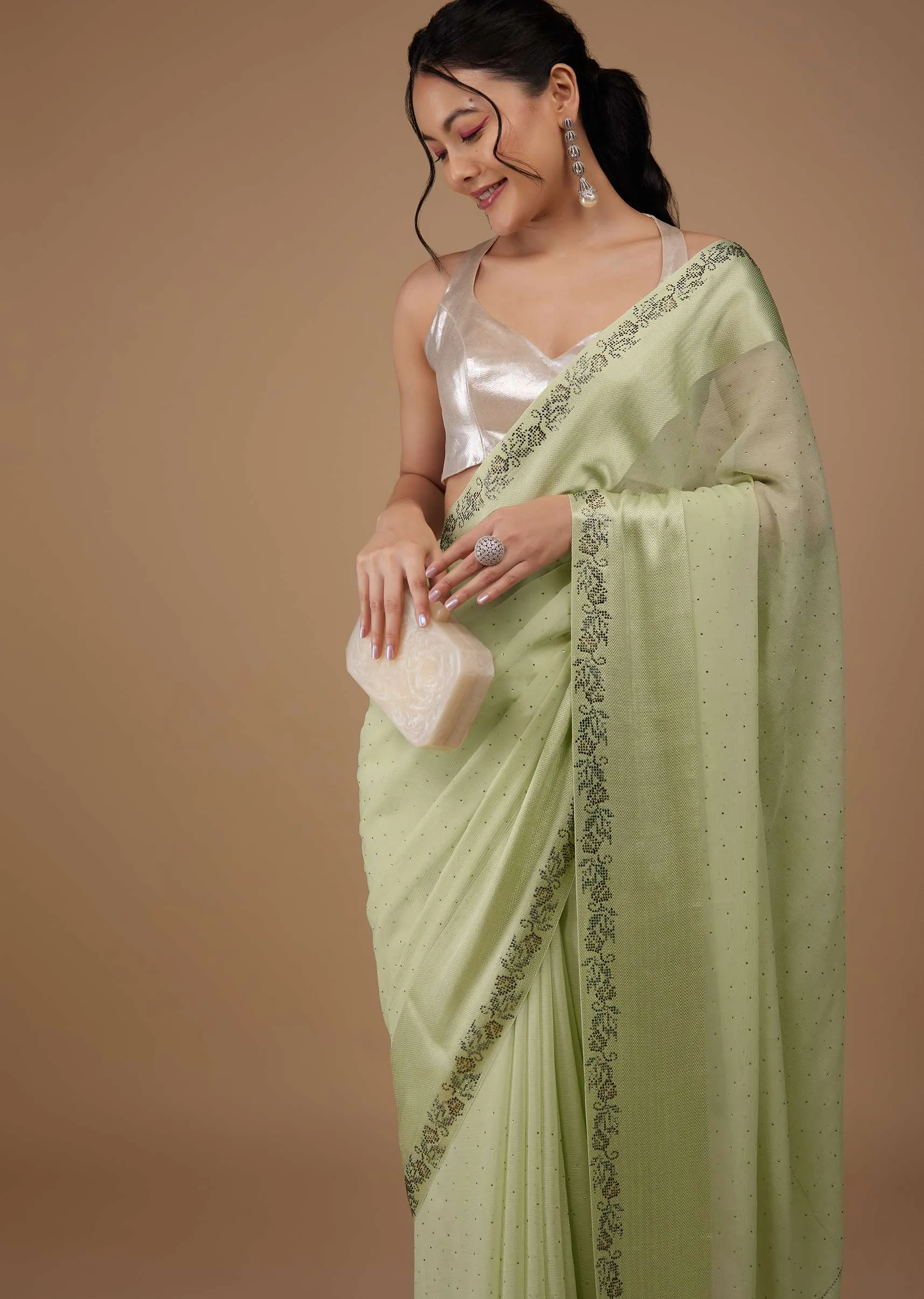 Moss Green Chiffon Saree With Stone Embellishments And Satin Border