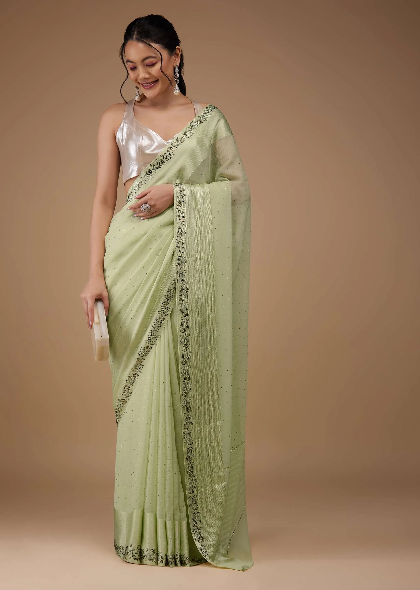 Moss Green Chiffon Saree With Stone Embellishments And Satin Border