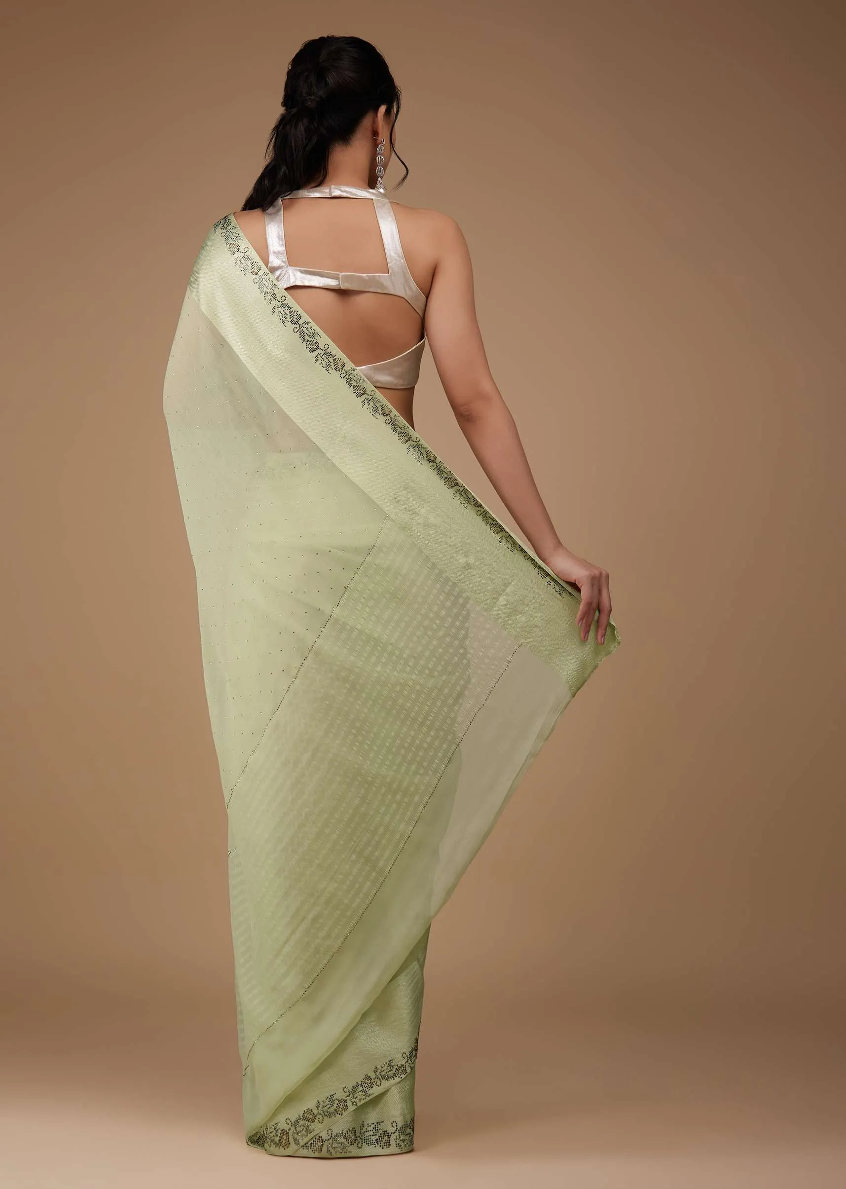 Moss Green Chiffon Saree With Stone Embellishments And Satin Border